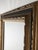 A handsome large-scale vintage wood picture frame featuring a richly layered gold and deep blue finish with carved...