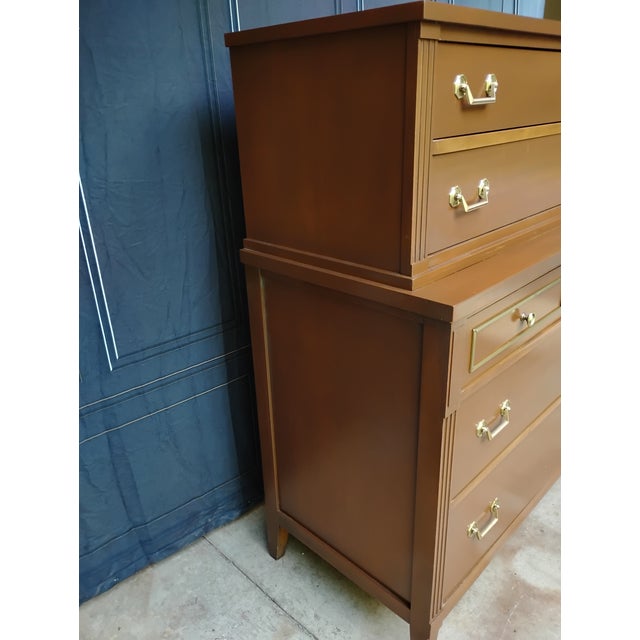 A beautiful traditional / mid century dresser inspired by Kindel Furniture. This dresser has been restored and refinished....