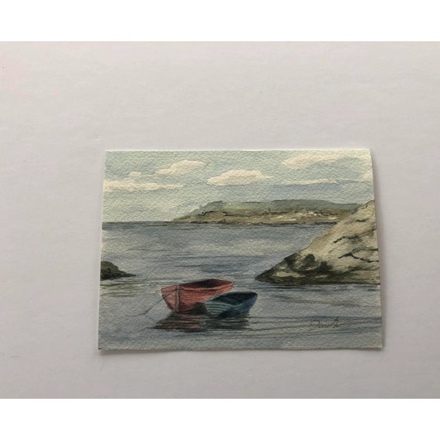 Differences are what make the world such an interesting place. Here we have two boats, differing in size and color and...