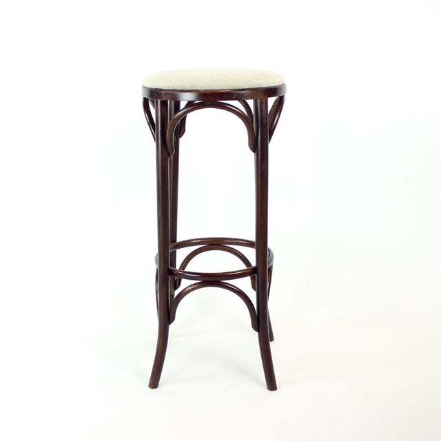 Elegant mid-century bar stools, model No. 73, produced by TON. Beautifully crafted from bentwood, showcasing graceful...