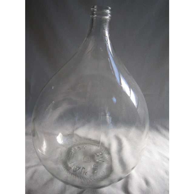 Oversized 70's Era Italian Glass Demijohn. Stamped on bottom, "Made in Italy", it's the perfect neutral accessory....