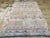 A vintage Moroccan Folk Kilim flatweave from the late 20th century. Slate blue, yellow, red, black, and white are among...