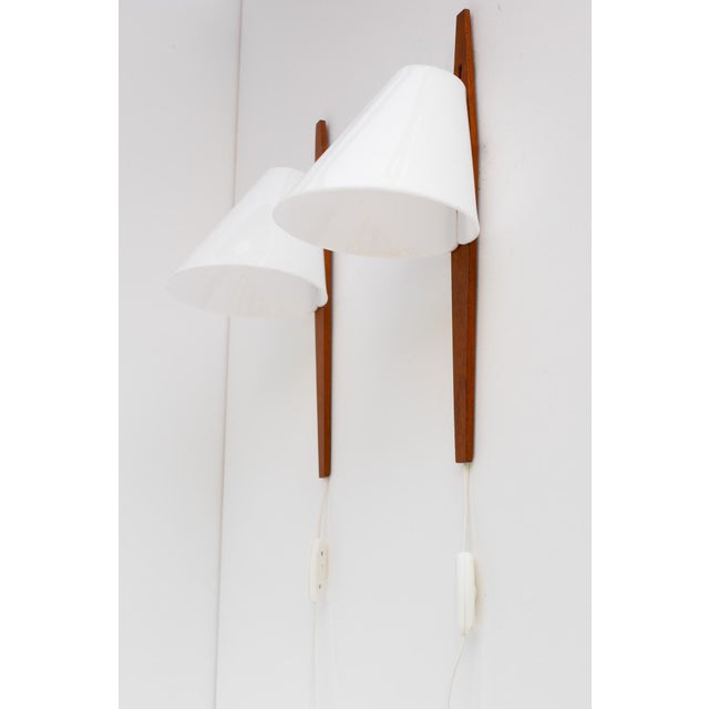 Rare midcentury swedish sconces, designed by uno and östen kristiansson for luxus, sweden, 1960s. with simplicity and...