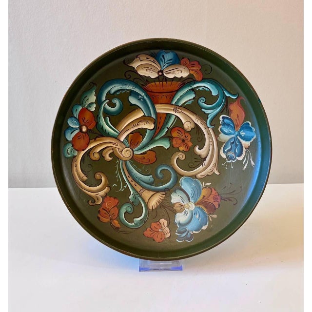 A vintage Norwegian hand-painted wooden bowl dated 1994, decorated in a traditional Rosemaling-inspired folk art style....