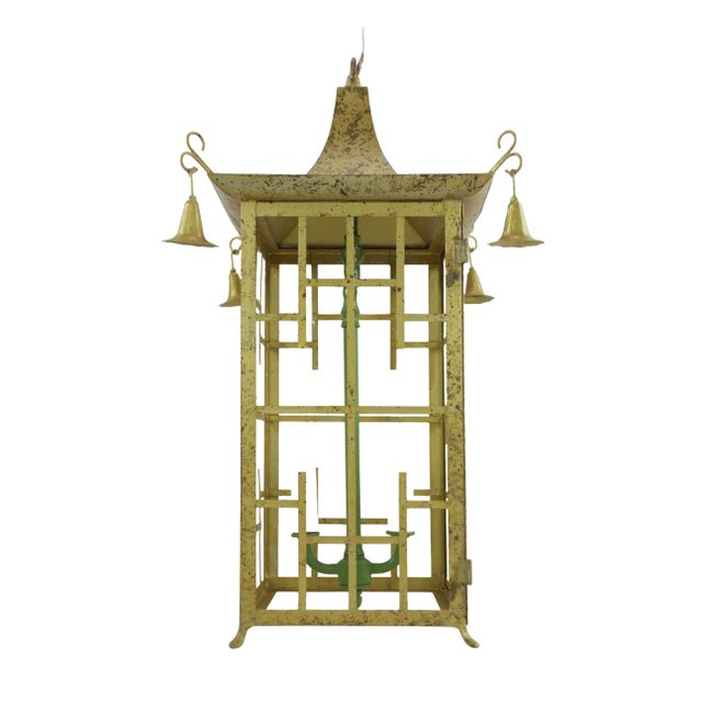 English Regency-style gilded tower double light chandelier.English Regency style (20th century) gilded pagoda-shaped...