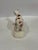 This is a 19th Century Staffordshire cow figurine. It is hand painted with iron red and brown patches. It has an adorable...