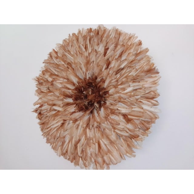 Juju hat beige of 31" (80 cm). Juju hat made with natural feathers and rattan. Juju hat woven and handcrafted. Beautiful...