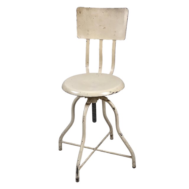 Antique 1920s industrial medical stool chair, once used in an operating room of an old hospital. Adjustable height with a...