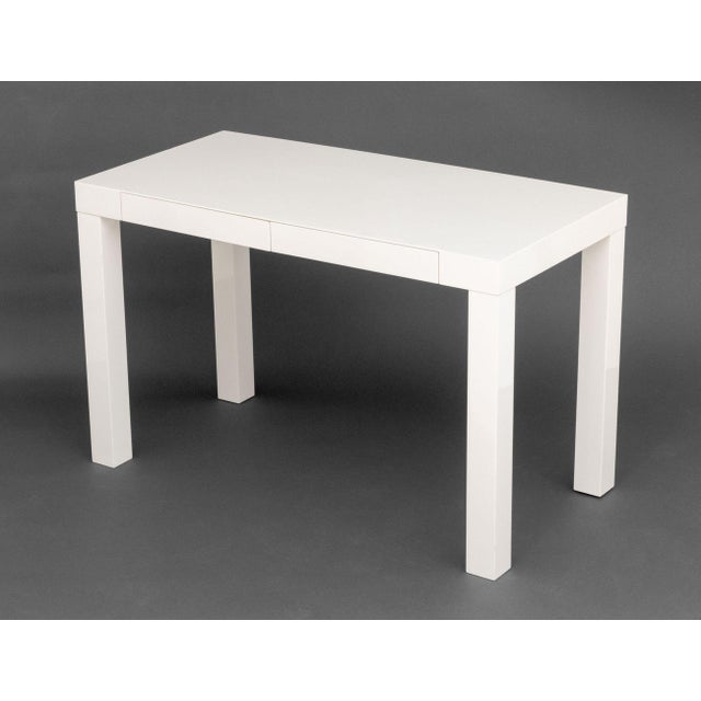 Modern White Lacquered Parson's Desk, with two short drawers. 30" H x 48" W x 24" D. Provenance: From an Upper East Side...