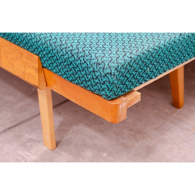 Mid century sofa bed,made in the former Czechoslovakia in the 1970´s. The sofa has a beechwood structure, it´s in good...
