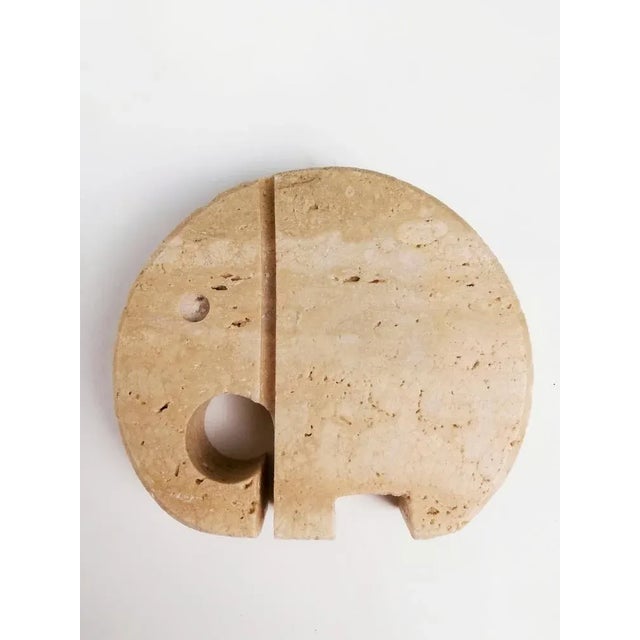 A Mid Century set of paperweight sculptures depicting a family of elephants. It was produced in Italy in the 70s and is...