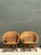 Exemplifying mid-century modern organic design, this pair of vintage lounge chairs showcases sculpted, curved silhouettes...