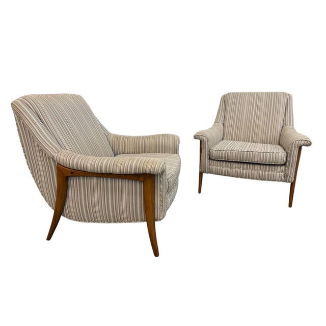 An exceptional pair of Mid-Century Modern Kroehler Avant Walnut Upholstered Arm Chairs, showcasing the sophisticated...