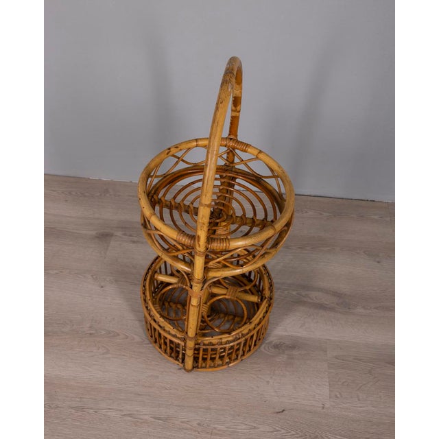 Bamboo and wicker bar basket, with bottle holder on the lower level, Italian design, 1960s.