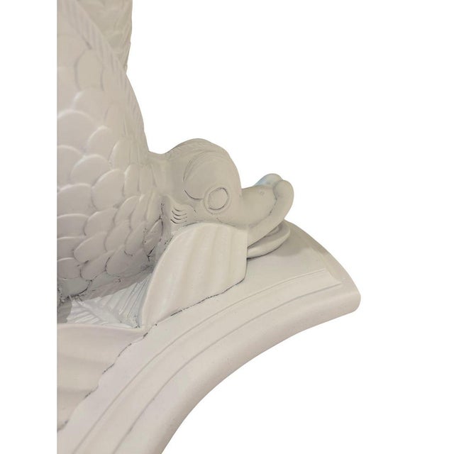 Bartolozzi and Maioli dolphin carved table base with glass top.