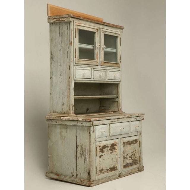 Awesome American pine original paint Child's Cupboard finished in a stunning Georgian Blue with glass knobs.