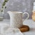 With a soft grey colourway, this cream jug from Pure Morris by Spode features a beautifully subtle take on the Willow...