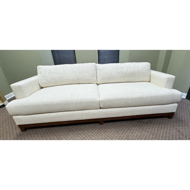 The Lee Industries 3475-32 Two Cushion Sofa in Belfast Natural fabric offers a refined blend of comfort and...