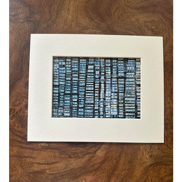 An original abstract composition featuring a rhythmic grid of hand-pulled geometric forms in layered shades of blue,...