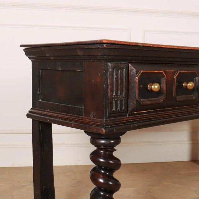 19th C English 3 drawer oak dresser base with barley twist legs. 1830. This piece is designed in the style of the selected...