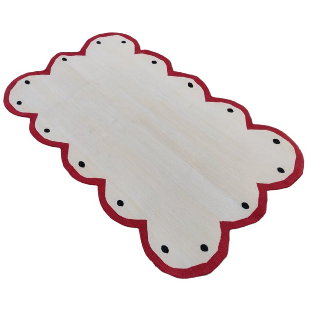 Cotton Scalloped Edge 3'x5' Reversible Rug. Scalloping runs all the way around. These special flat-weave dhurries are...