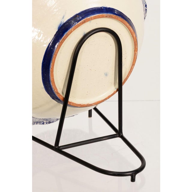 This oversized decorative bowl pays tribute to Don Miguel Costilla, also known as Father Junípero, through a hand painted...