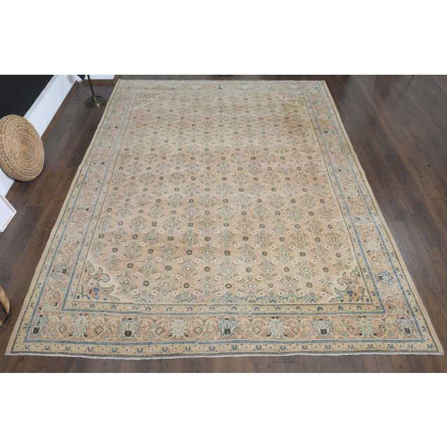 Vintage Persian Hand-Knotted area rug is a semi-antique vintage area rug. The '70s Eastern region of Anatolian's unique...