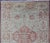 This modern Indian Khotan rug has been hand-knotted in wool and features a floral medallion design rendered in light blue...
