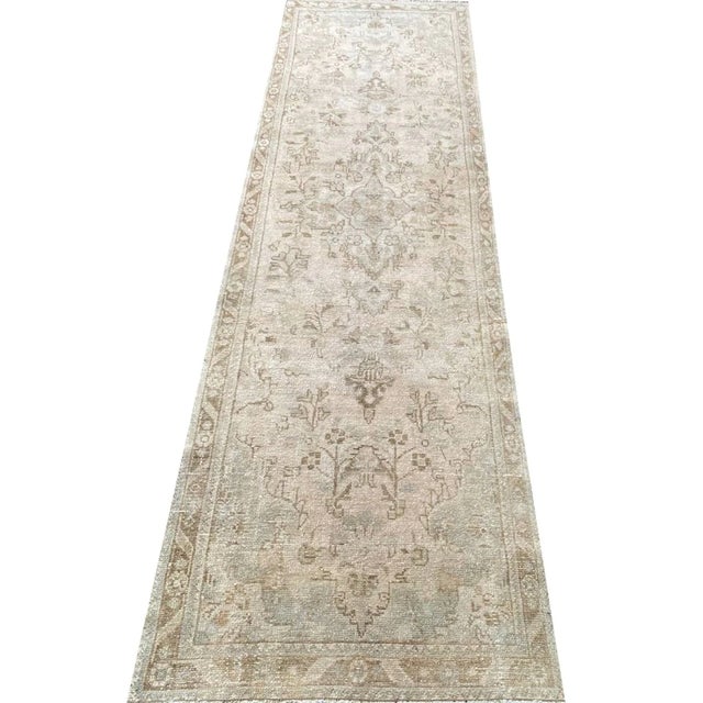 Exact Size: 3'0" x 9'5" Color: Natural Age: Old Materials: Wool Construction: Hand Knotted
