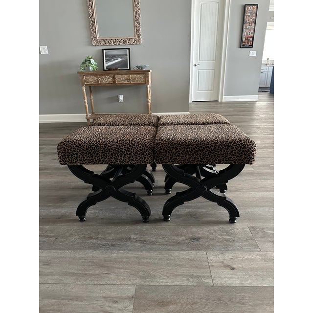 Two leopard print ottomans, (selling as a pair; two have sold) excellent condition, smoke free home. Purchased new in...