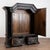 19th century Danish Baroque large armoire, crafted in oak. The cabinet features multi paneled doors above two lower...