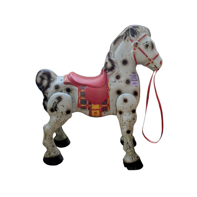 This Antique MOBO Bronco Ride On Toy Metal Horse from the 1950s is a rare vintage piece made in England. The sturdy metal...