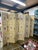 A sophisticated matching pair of 1980s four-panel folding screens with timeless Neoclassical styling. Hand-painted on both...
