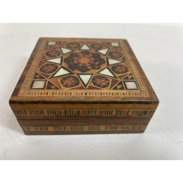 Vintage Middle Eastern Moorish Inlaid Marquetry Mosaic Trinket Box. Middle Eastern Moorish inlaid marquetry storage box....