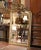 Standing over five and a half feet tall, this antique Louis XV giltwood mirror is distinguished by its impressive...