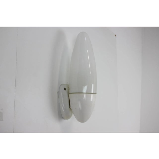 Made in Czechoslovakia. Made of bakelite, milk glass. New Cabling 1xE27 or E26 bulb. Re-polished. Good original condition....