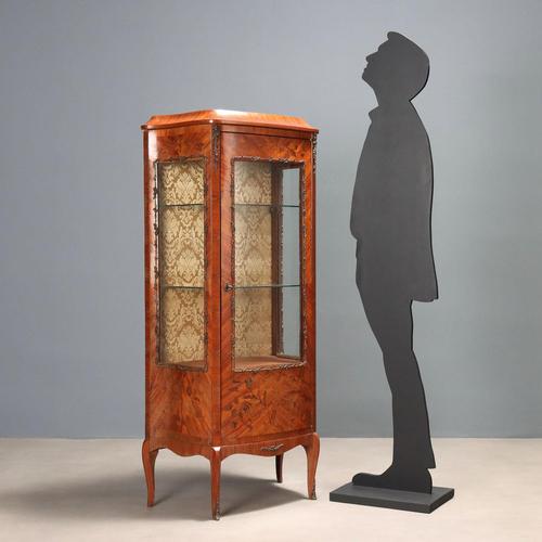 Napoleon III display cabinet, rosewood veneer. Mahogany floral inlays, gilded bronze appliques and moldings, central door...