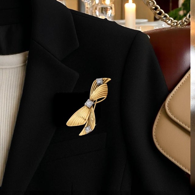 A Timeless Emblem of Elegance and Grace Indulge in the enduring beauty of this Tiffany & Co. Vintage Diamond Bow Love Knot...