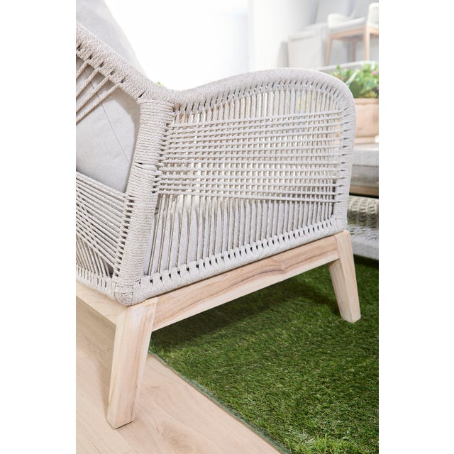 Experience unparalleled outdoor relaxation and coastal style with the Loom Outdoor Club Chair from Essentials For Living....