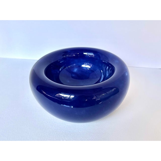 A beautifully hand-blown glass bowl in a striking cobalt blue. Selected by House of Else for its vibrant color and unique...