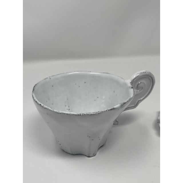 Signed Astier de Villatte “Régence” Tea Cup & Saucer – Artisan Made in Paris Capture the soul of Paris with this authentic...