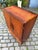 A true masterpiece of Danish furniture craftsmanship: This 1960s chest of drawers impresses with its elegant design and...