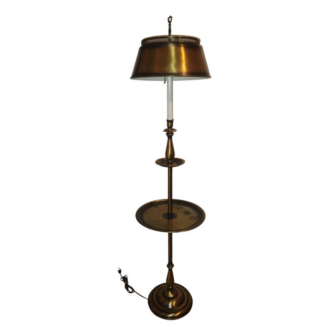 Discover the perfect blend of timeless elegance and practical functionality with this exquisite brass floor lamp. Crafted...