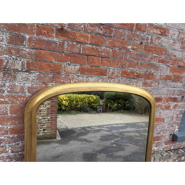W: 110cm (43.3")h: 132cm (52")d: 4cm (1.6") a wonderful large antique english 19th c arched top gilt plain overmantle...