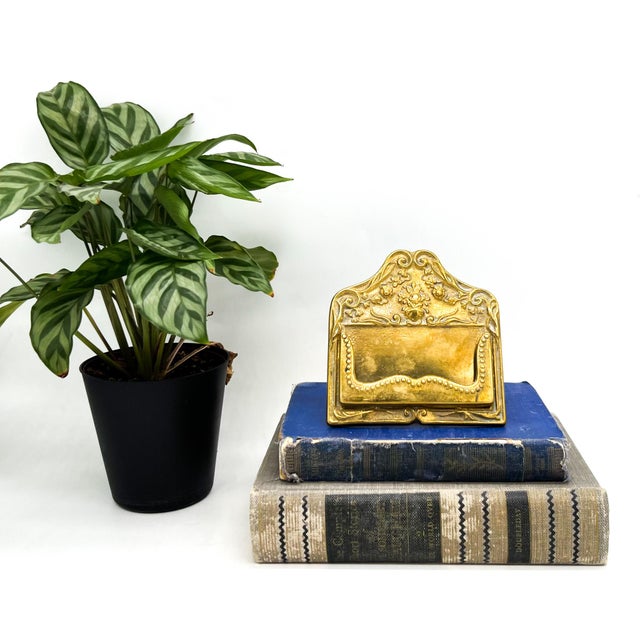 Ex mid-late 20th century Italian brass business card holder with an ornate floral and scrollwork design in a warm gold-...