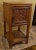 Hand-carved neo-Gothic table made of solid oak wood, dating from the 19th century. The front door is decorated with rich...