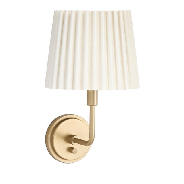 The Polly Wall Sconce brings an air of refined elegance with its single scalloped shade, casting a warm and comforting...