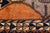 1950s Mid-20th Century Vintage Turkish Oushak Runner Rug With Geometric Medallions in Burnt Orange and Indigo Blue For Sale - Image 5 of 9