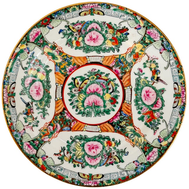 Set of twelve 9-inch mid-century Chinese Famille Rose Canton dinner plates hand-decorated with a large center medallion of...