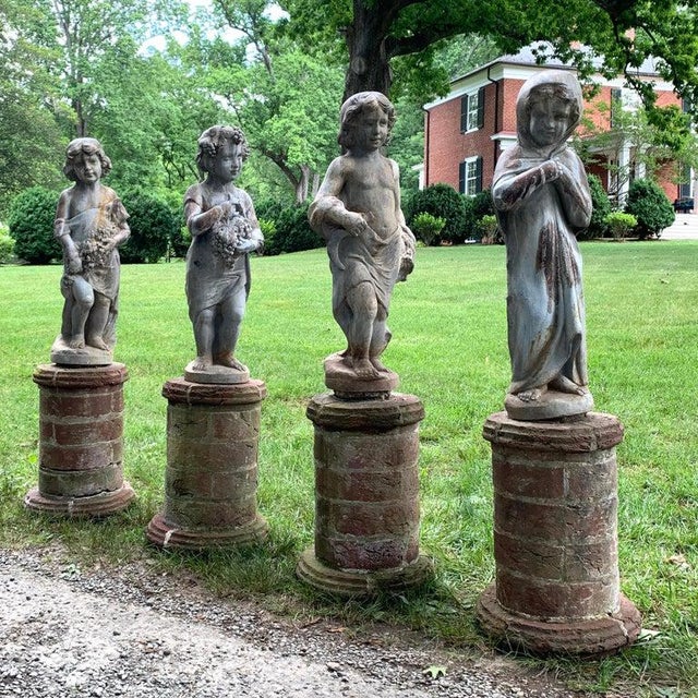 Set of Four Lead Garden Statues Depicting the Four Seasons Chairish